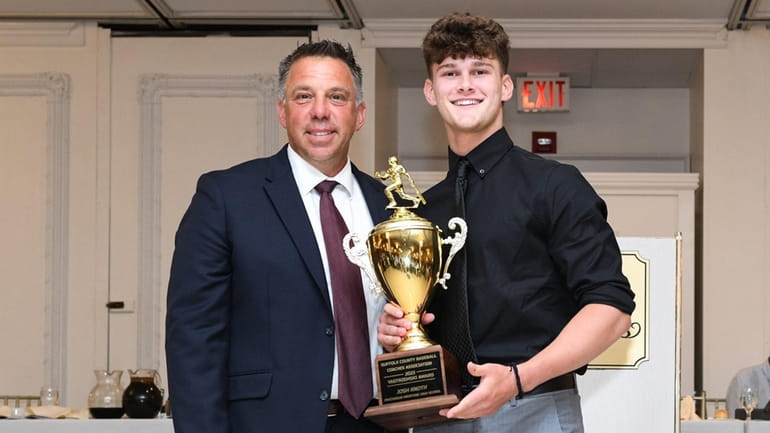 Josh Knoth of Patchogue-Medford poses with presenter Tony Frascogna after receiving the Yazstremski...