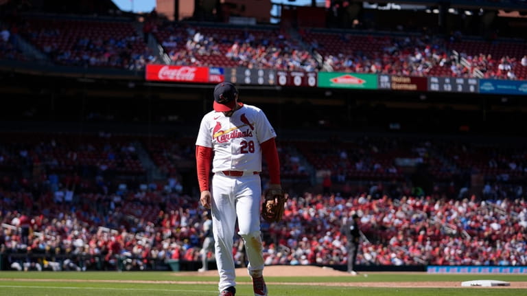 St. Louis Cardinals third baseman Nolan Arenado heads toward the...