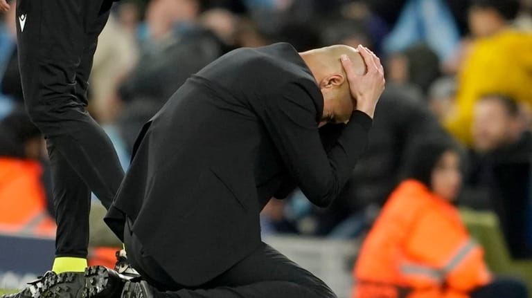 Manchester City's head coach Pep Guardiola reacts during the Champions...