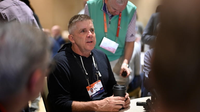 Denver Broncos head coach Sean Payton talks with reporters during...