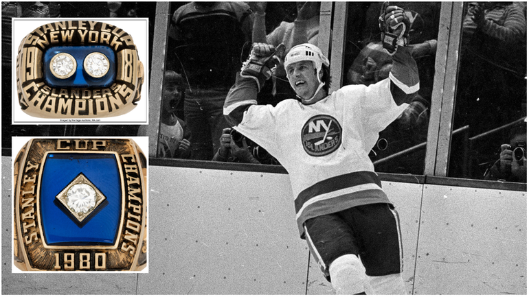 Mike Bossy's Stanley Cup rings from 1980 and 1981 with...
