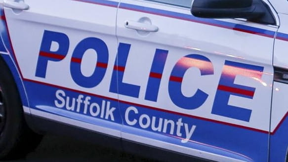 A Suffolk police officer investigating a drunken driving crash early...