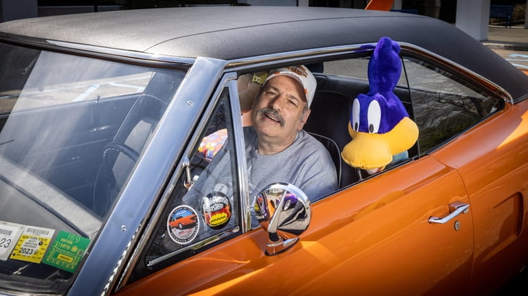 Mike Horowitz sits in his 1970 Plymouth Superbird in Melville, April 14,...