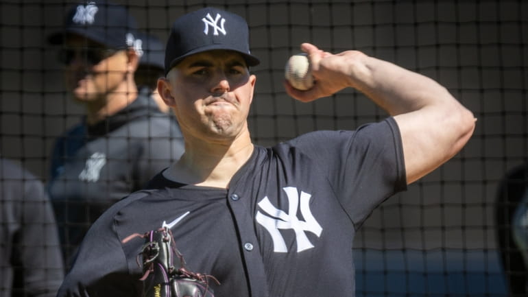 Yankees pitcher Carlos Rodon pitches live batting practice during spring training at...