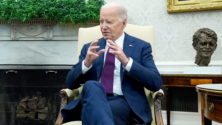 President Joe Biden speaks during a meeting with Prime Minister...