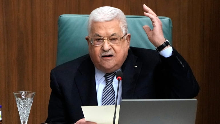 Palestinian President Mahmoud Abbas speaks during a conference to support...