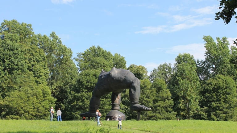 Visitors check out sculptures at the Storm King Art Center...