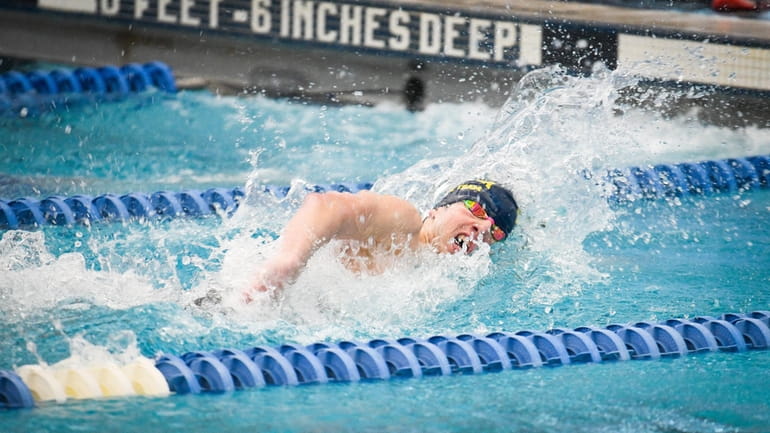 Chaminade's Stephen McDonald competes in the 400 Relay preliminary round...