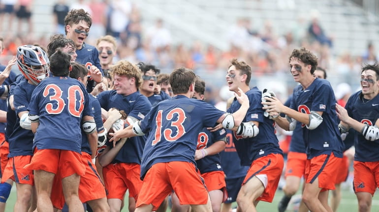 Manhasset celebrates its win in the New York State Class C...