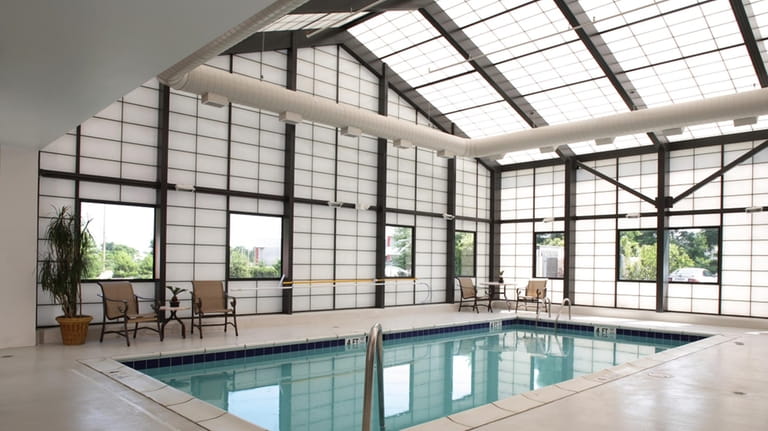 The climate-controlled indoor pool at The Hampton Inn Long Island/Islandia.