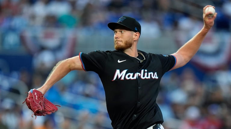 Miami Marlins' A.J. Puk delivers a pitch during the first...