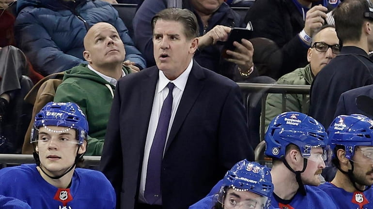 Head coach Peter Laviolette of the New York Rangers against...