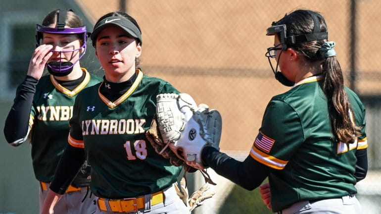 Katie Sharkey of Lynbrook makes the catch to end the...