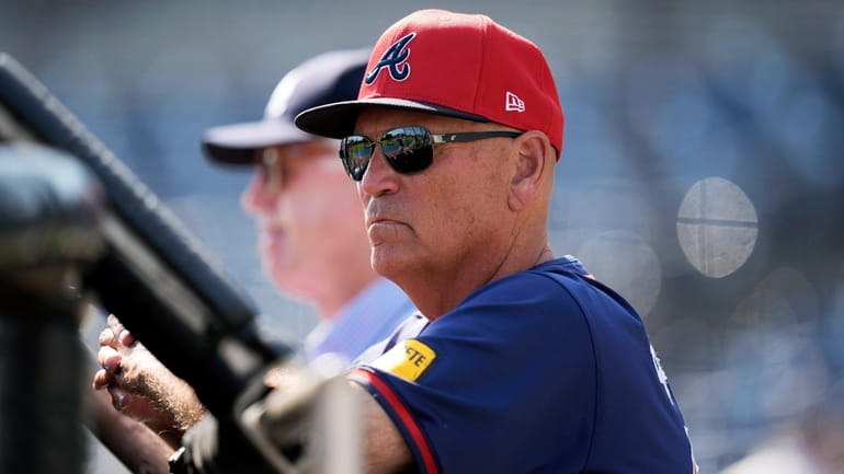Atlanta Braves manager Brian Snitker watches batting practice before a...