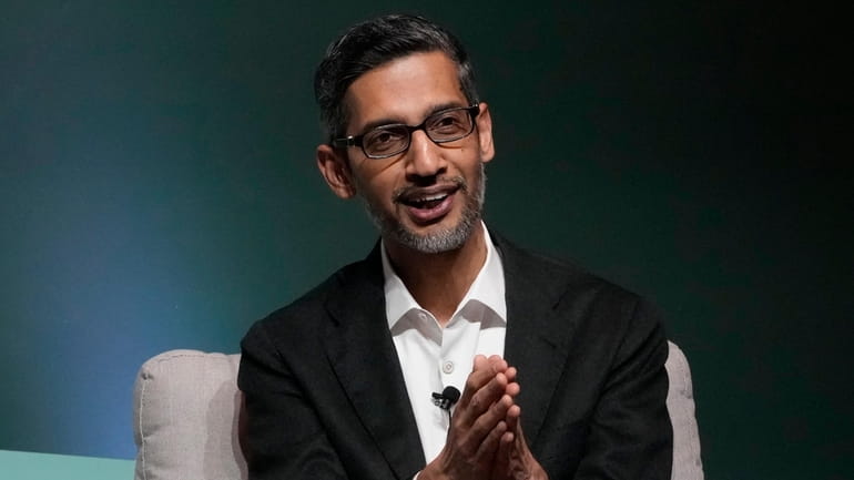 Google and Alphabet CEO Sundar Pichai speaks at the Business,...
