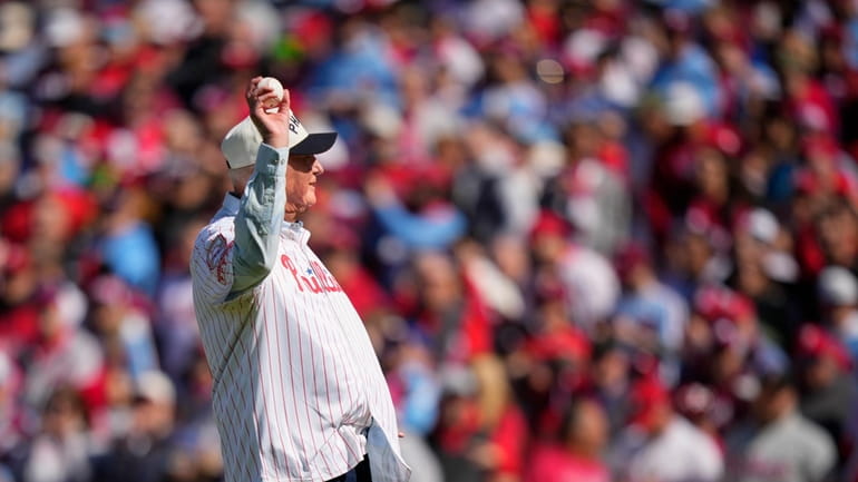 Former Philadelphia Phillies manager Charlie Manuel throws out a ceremonial...