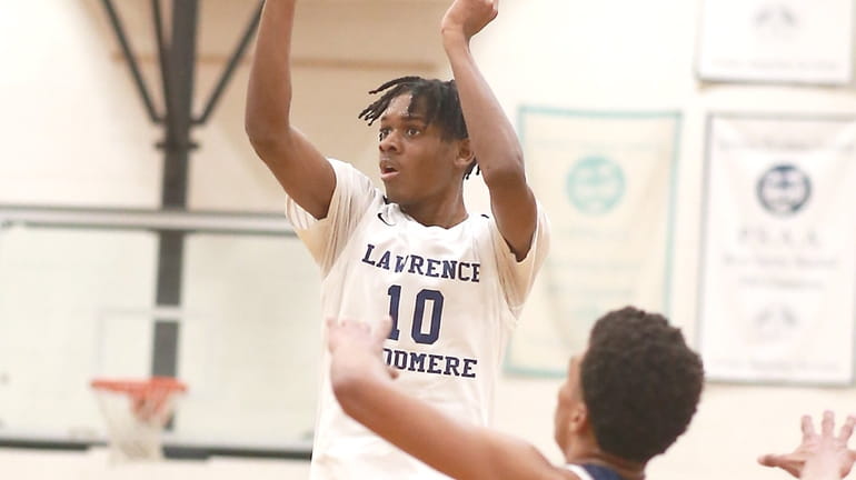 Lawrence Woodmere Academy’s Josh Smith shoots from long distance as...
