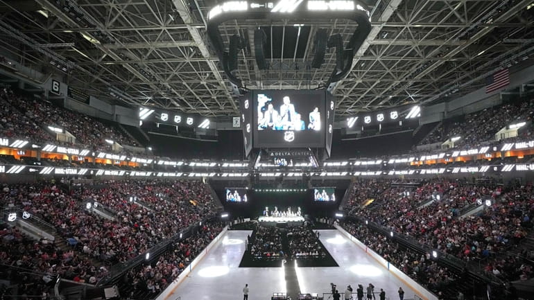Players on Utah's NHL hockey team are introduced Wednesday, April...