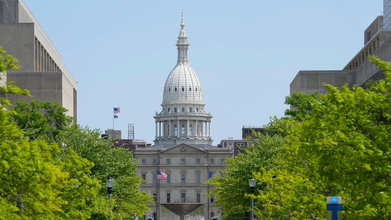 The Michigan Capitol is seen, May 24, 2023, in Lansing,...