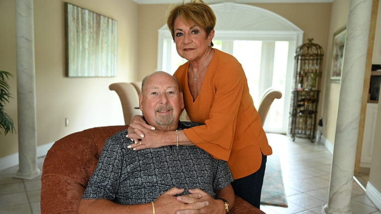 Stanley Lang of Commack, shown with his wife, Jean, says a...