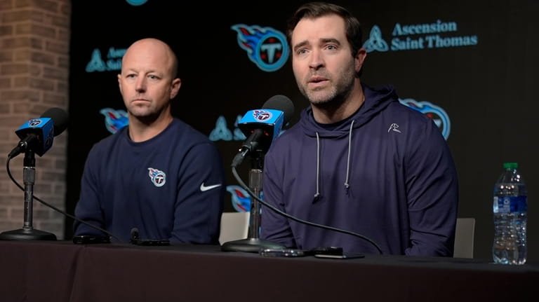 Tennessee Titans head coach Brian Callahan, right, and offensive coordinator...