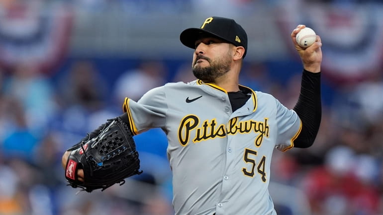 Pittsburgh Pirates' Martin Perez delivers a pitch during the first...