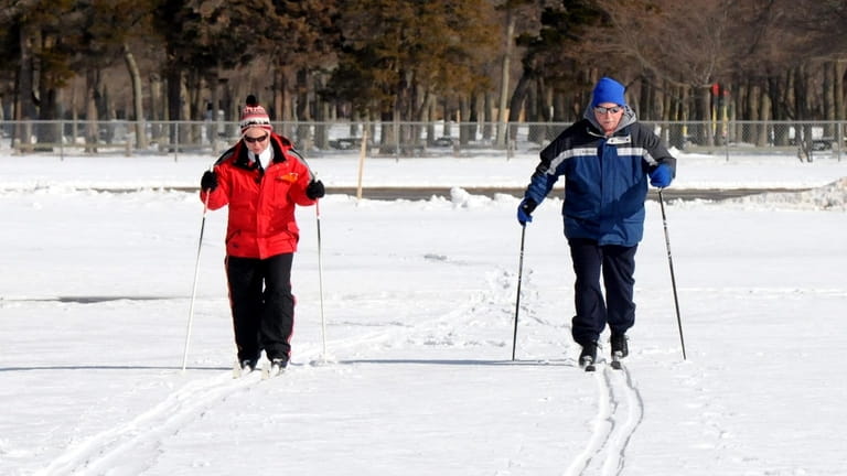 Angela and Rich Kovler, of North Massapequa, enjoy cross-country skiing...