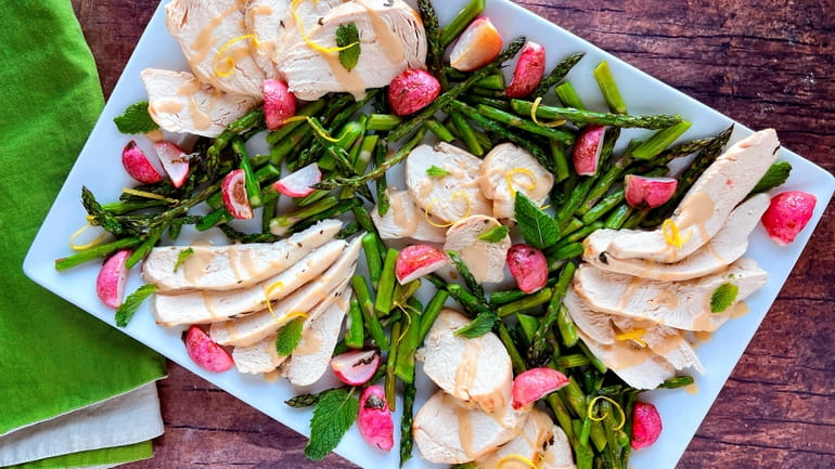 Chicken, asparagus and roasted radishes with a creamy almond-lemon sauce.