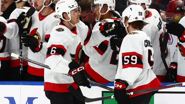 Ottawa Senators defenseman Jakob Chychrun (6) celebrates his goal with...