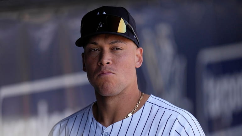 New York Yankees center fielder Aaron Judge walks in the...