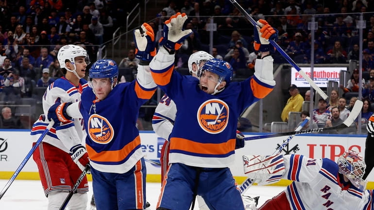 Bo Horvat #14 of the Islanders celebrates his first period...