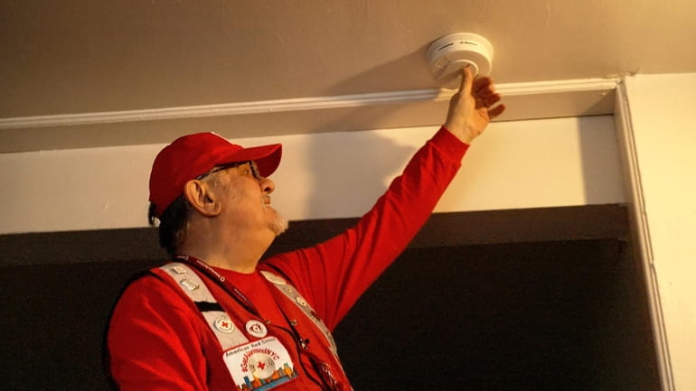 Volunteers from the American Red Cross installed free smoke alarms...