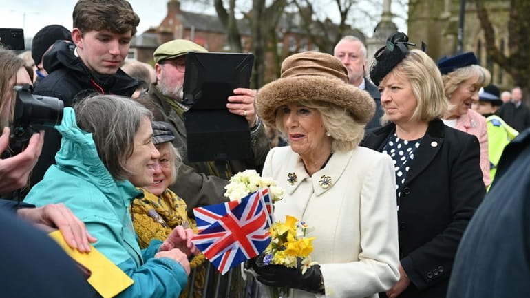 Britain's Queen Camilla meets well-wishers after attending the Royal Maundy...