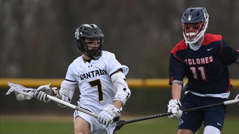 Dylan Martini #7 of Wantagh, left, gets in position to...