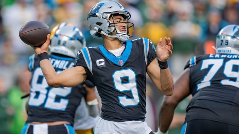 Carolina Panthers quarterback Bryce Young (9) throws a pass during...