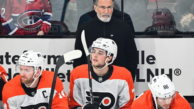 Philadelphia Flyers head coach John Tortorella looks on from the...