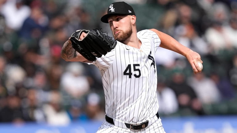 Chicago White Sox starting pitcher Garrett Crochet delivers during the...