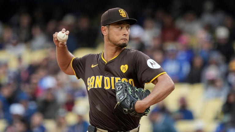 San Diego Padres pitcher Yu Darvish (11) throws a pitch...