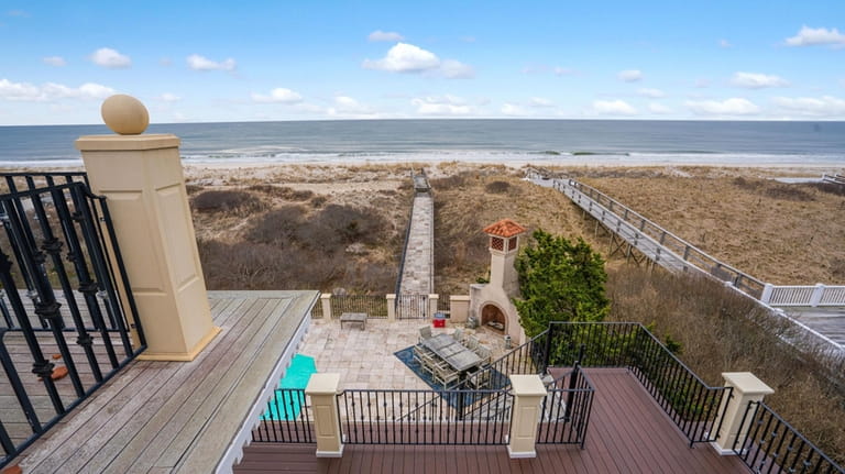 This East Quogue home on Dune Road is on the...