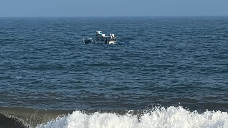 A patrol boat in the waters off the coast of...