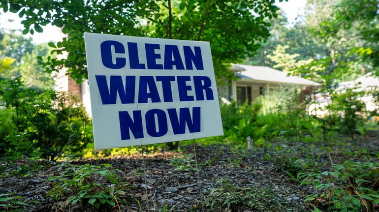 Residents in Manorville peppered their lawns with signs calling for...
