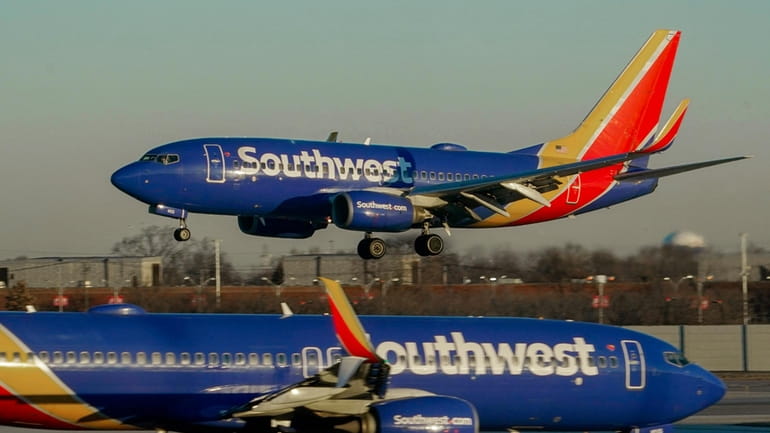 Southwest Airlines plane prepares to land at Midway International Airport,...