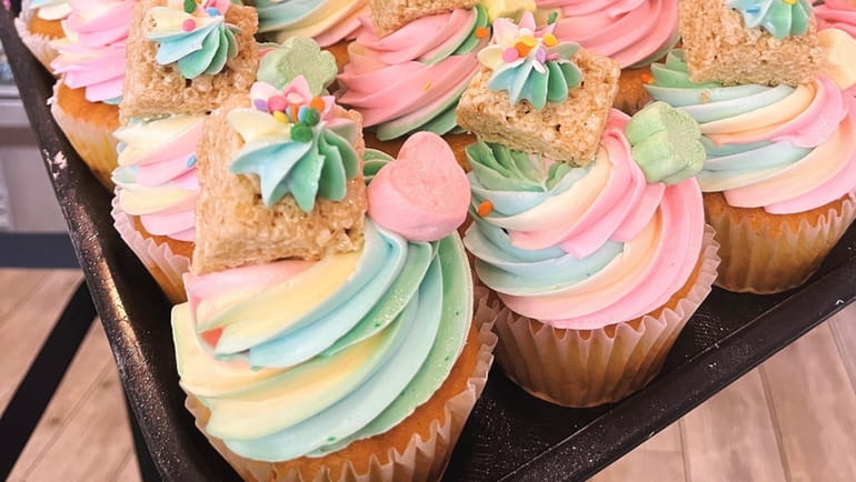 Whisk Bakery tops its Lucky Charm cupcakes with a rainbow...