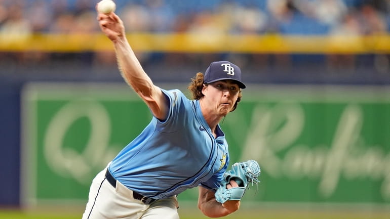 Tampa Bay Rays starting pitcher Ryan Pepiot delivers to the...