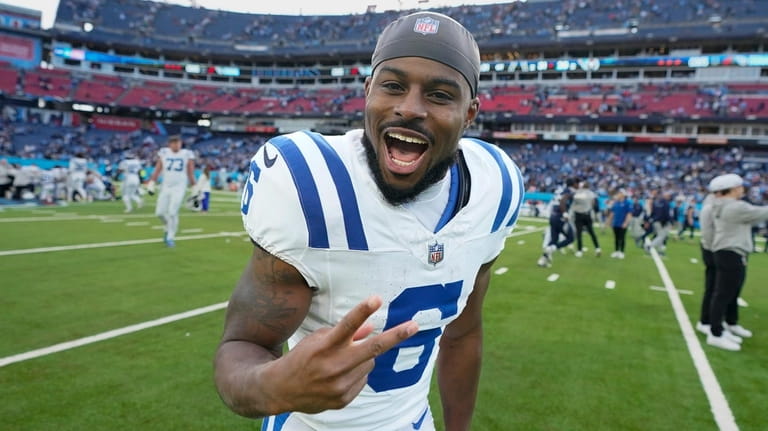 Colts wide receiver Isaiah McKenzie celebrates the team's overtime win...