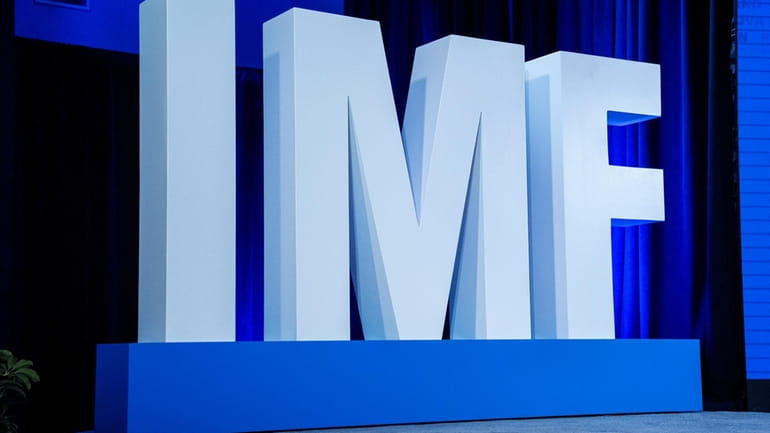 Letters spell out IMF during a news conference about the...