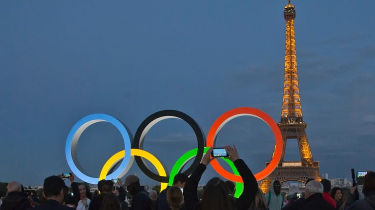 The Olympic rings are set up on Trocadero plaza that...