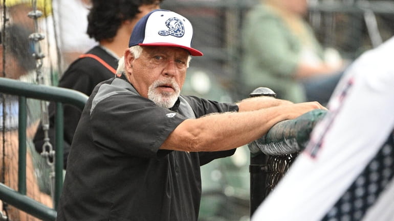 Long Island Ducks manager Wally Backman looks on from the...