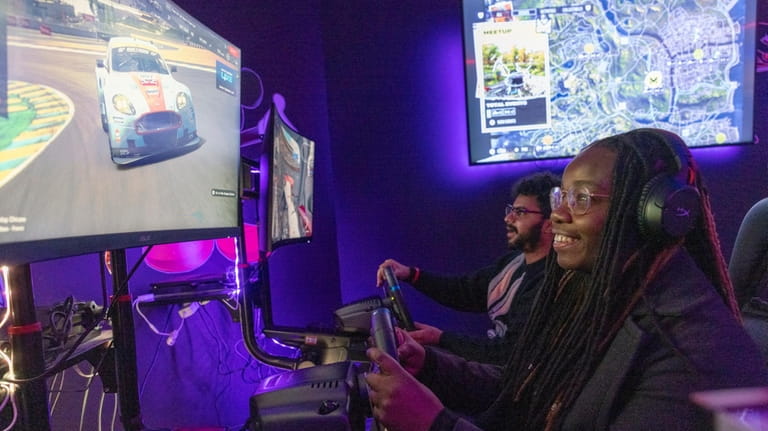 Tanika Cherfils and Michael Ismael play games at Gamers Club...