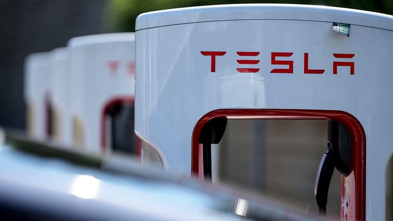 A Tesla charging station is seen, Sept. 28, 2023, in...